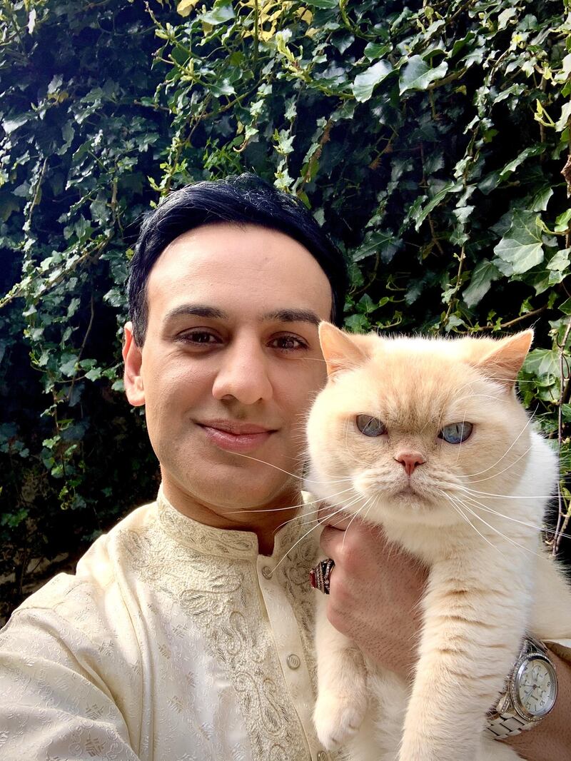 Amanullah De Sondy with his cat, Sula: 'It is a huge privilege to be granted citizenship' 