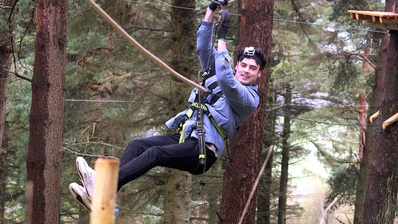 Irish Times reporter Nathan Johns tries out one of the course's zip lines. Photograph: Bryan O Brien/The Irish Times 

