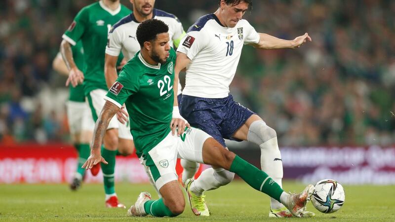 Dusan Vlahovic of Serbia is challenged by the Republic of Ireland’s Andrew Omobamidele during the World Cup qualifier against Serbia. Photograph: Oisín Keniry/Getty Images