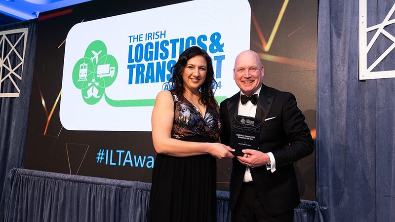 Alison Mifsud, associate director, corporate banking, AIB presents the logistics & transport SME company of the year award to Mick Mc Connell, Road Truck Services.