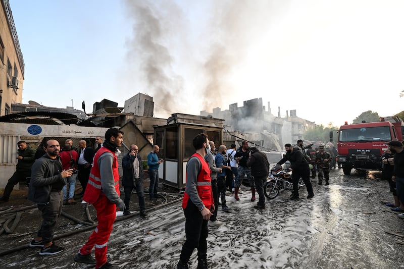 People check the damage following a reported Israeli strike in the Mazzeh district of Damascus on Thursday. Photograph: Louai Beshara/AFP via Getty