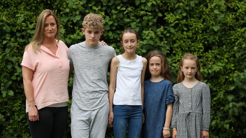 Tara O’Halloran, whose husband Richard was not allowed leave China for almost three years, with their children Ben, Amber, Isabella and Scarlett. Photograph: Nick Bradshaw