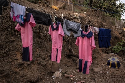 School uniforms on a line in Freetown, the capital of Sierra Leone.