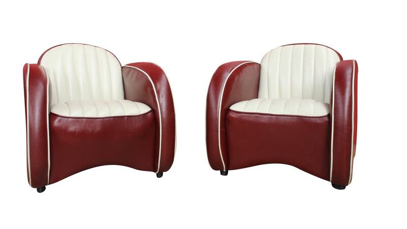 Pair of red and cream ribbed leather tub chairs €400-€600.