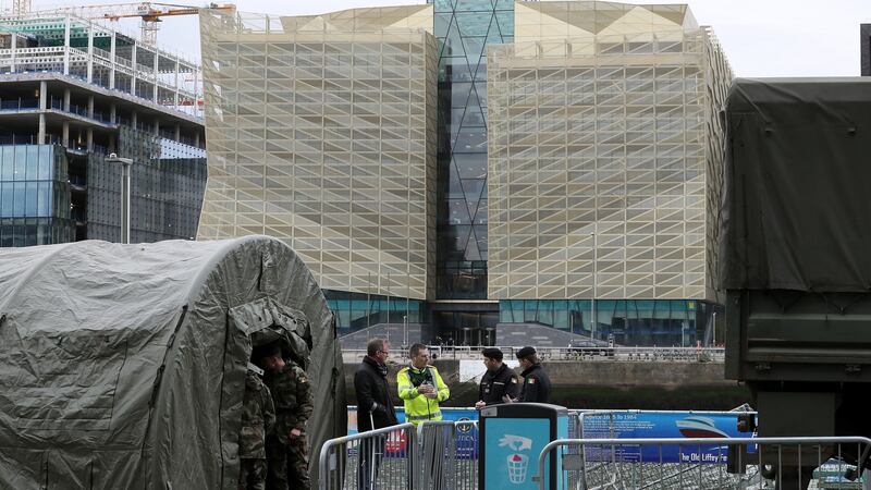 Defence forces tents opposite the Central Bankon Sir John Rogerson’s Quay in Dublin. Photograph: Brian Lawless/PA Wire