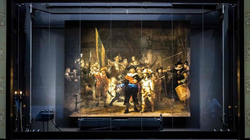 The Night Watch remounted at the Rijksmuseum. Photograph:  Remko De Waal/ANP/AFP via Getty Images