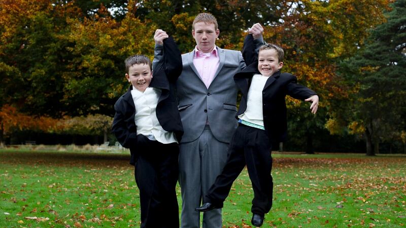 John Connors with nephews Michael and Thomas at the National Bravery Awards at Farmleigh House in Dublin. Photograph: Maxwells