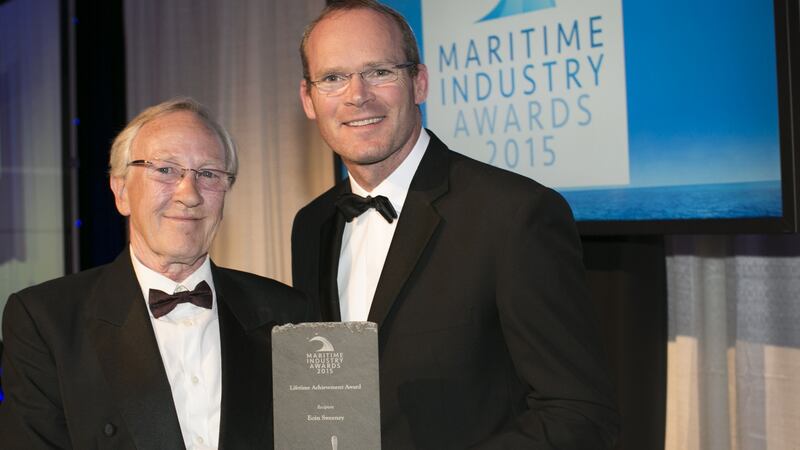 Eoin Sweeney: receiving his lifetime achievement award from then minister Simon Coveney