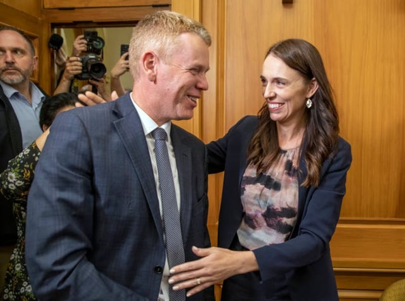 New Zealand's next prime minister Chris Hipkins with outgoing leader Jacinda Ardern. Photograph: AP