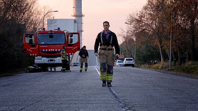 Firefighters work on the scene of an explosion at a petrochemical company in Tarragona, Spain. Photograph: Susanna Saez/EPA