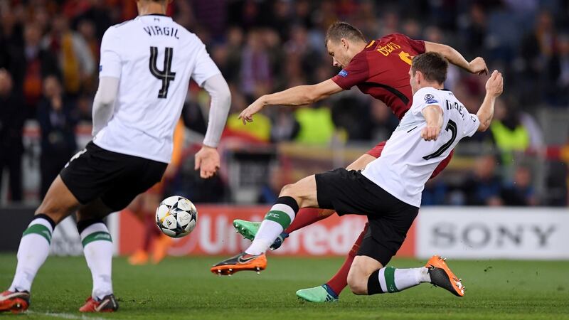 Roma’s Edin Dzeko scores their second goal during the Champions League semi-final second leg against Liverpool at Stadio Olimpico in Rome. Photograph: Alberto Lingria/Reuters