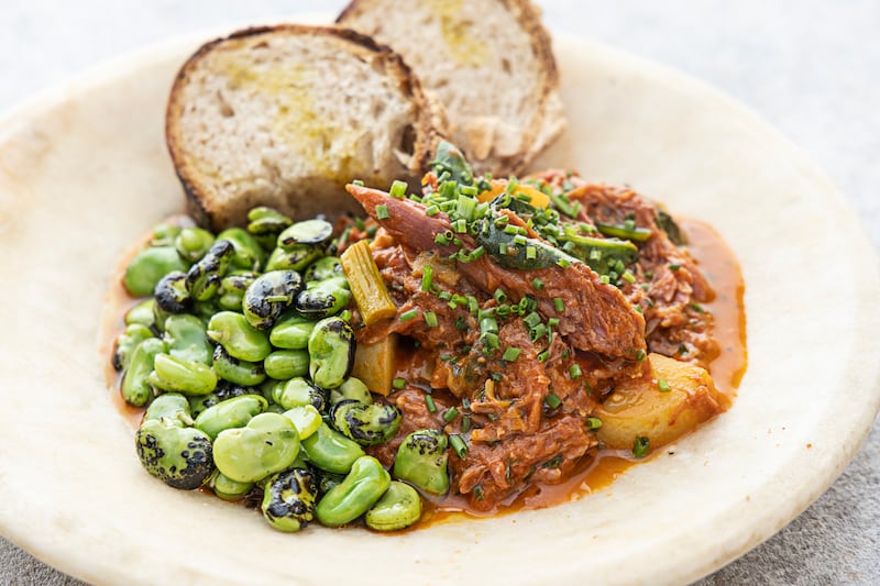 Lightly grilled broad beans with a ham hock ragout. Photograph: Harry Weir Photography