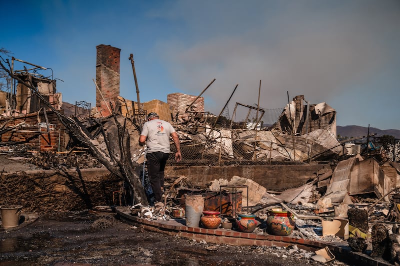 Days after a devastating wildfire, residents of Pacific Palisades have started sifting through the ruins, and their memories. Photograph: Ariana Drehsler/The New York Times