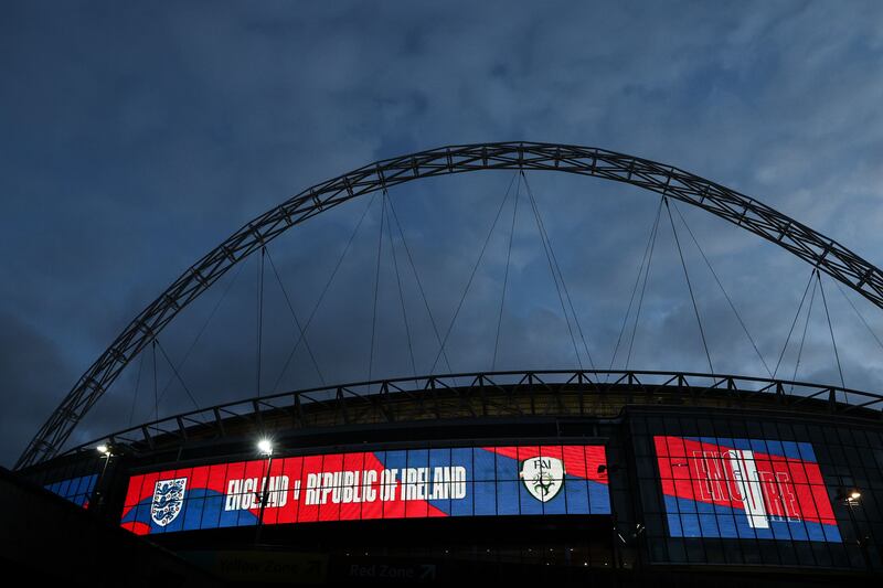 Wembley Stadium lit up ahead of a freidnly between England and the Republic of Ireland in November 2020. Photograph: Tommy Dickson/Inpho