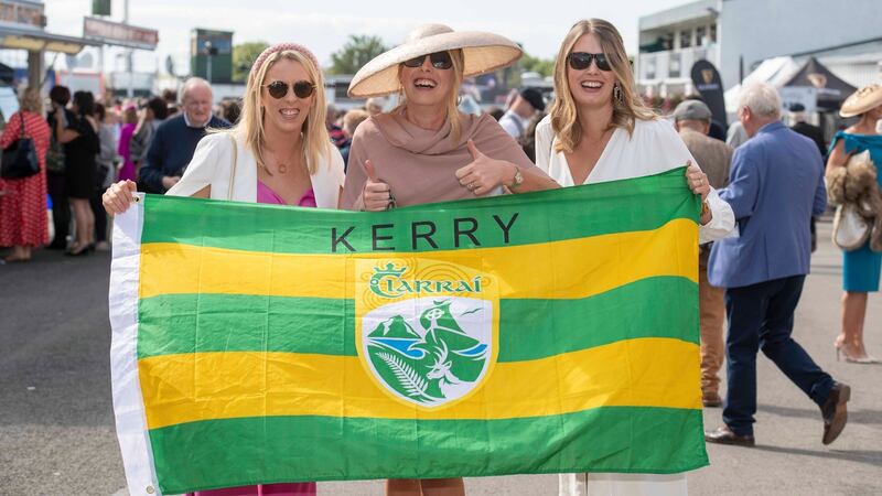 Dr Siobhan Griffin, Seana Quane and Muireann Quane from Ballybunion    show their support for Kerry footballers during ladies day at the  Listowel Races. Photograph:  Domnick Walsh/Eye Focus