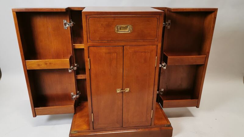 Mahogany and brass campaign style drinks cabinet €800- €1,200