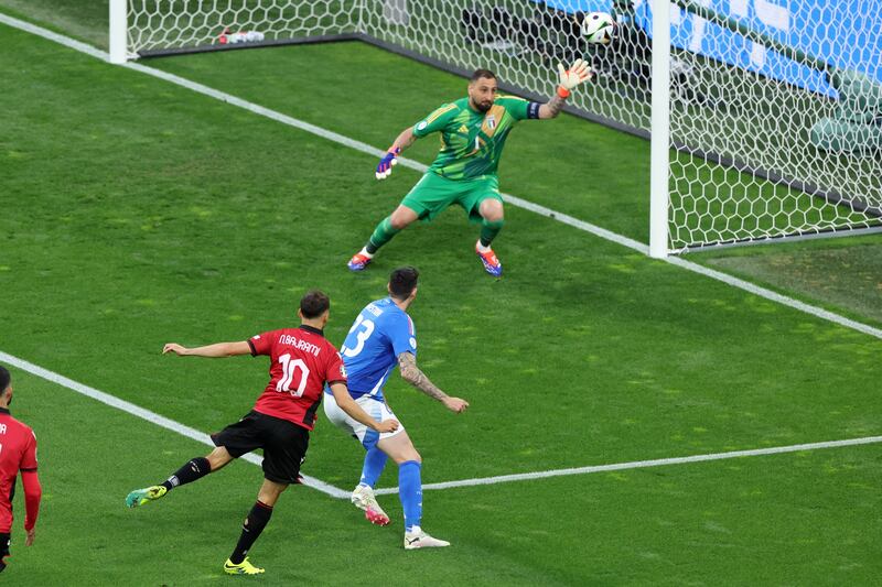 Nedim Bajrami of Albania scores the fastest goal in the history of the European Championships after just 23 seconds during the Group B game against Italy in Dortmund. Photograph: Georgi Licovski/EPA