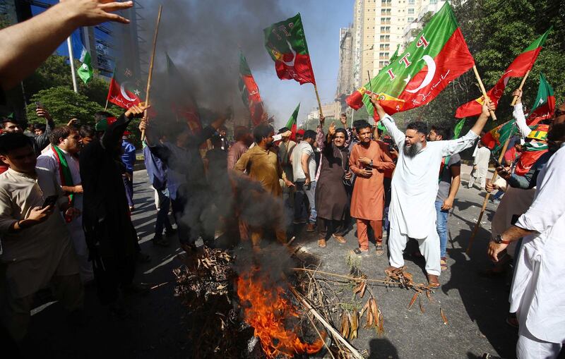 Supporters of Pakistan's former Prime Minister Imran Khan attend a protest against his arrest in Karachi. Photograph: Shahzaib Akber/EPA