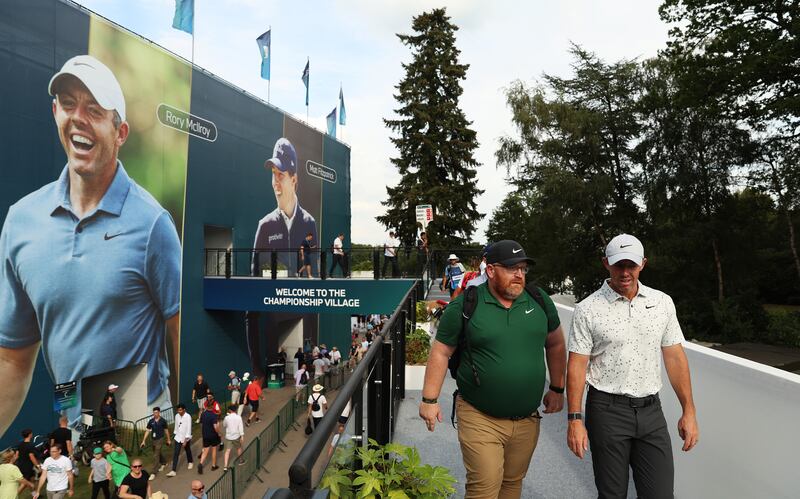 Rory McIlroy leaves the 18th green over a bridge following his round on day three of the BMW PGA Championship at Wentworth. Photograph: Luke Walker/Getty Images