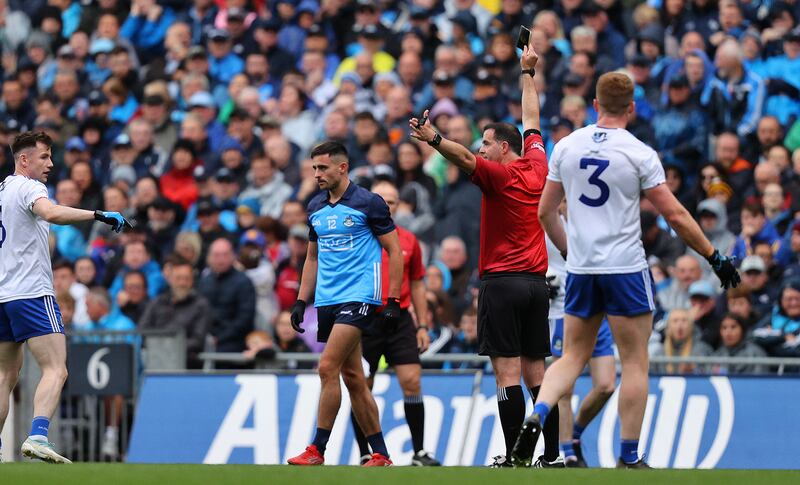 Dublin's Niall Scully is shown a black card by referee Sean Hurson. Photograph: Bryan Keane/Inpho