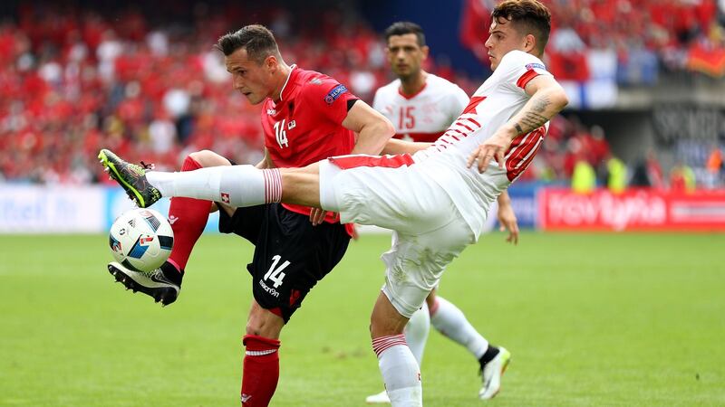 Taulant Xhaka of Albania in action against his brother Granit Xhaka of Switzerland during the European Championship clash in 2016. Photograph:  Paul Gilham/Getty Images