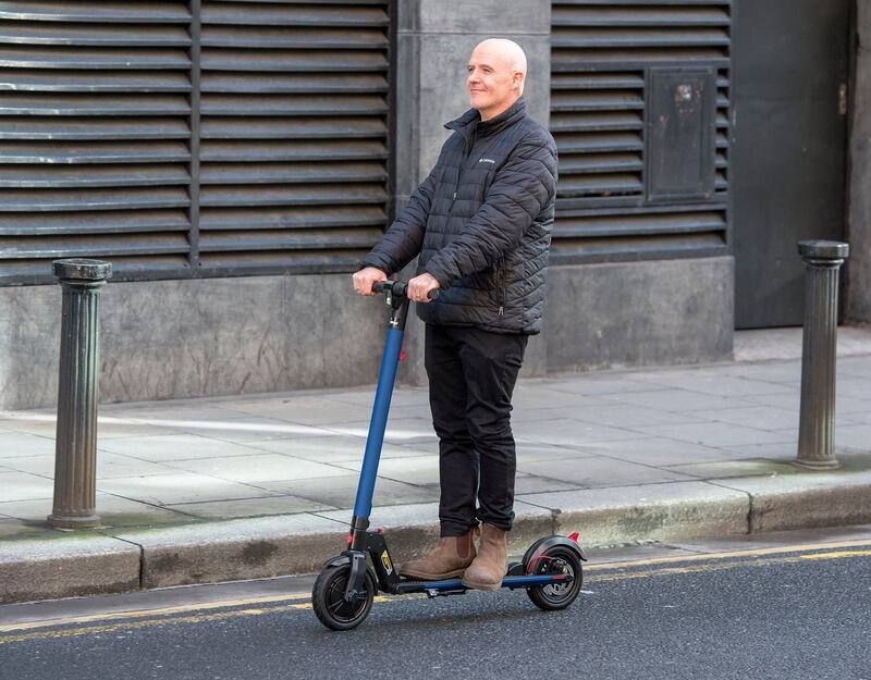 Conor Pope test drives an electric scooter in Dublin. Photograph: Dave Meehan for The Irish Times