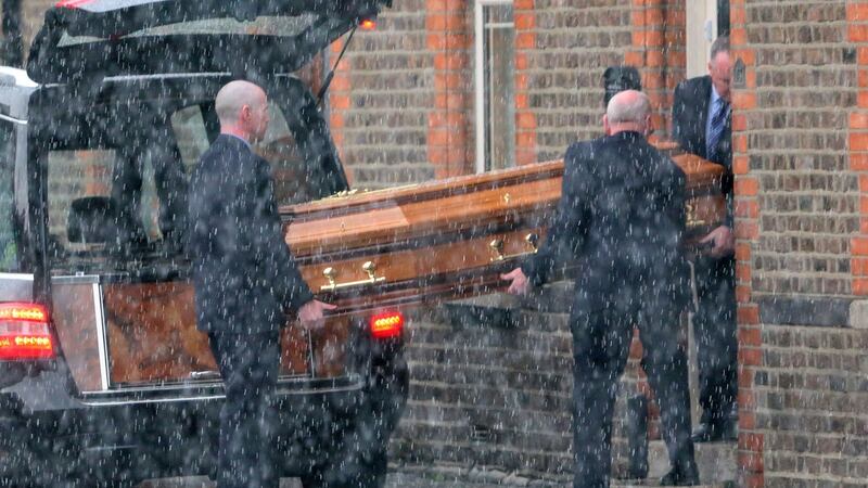 The remains of Eddie Hutch, who was shot dead in his home in Dublin last week, are brought to his sister’s home on Portland Row on Wednesday evening under a heavy Garda presence. Photograph: Colin Keegan/Collins.