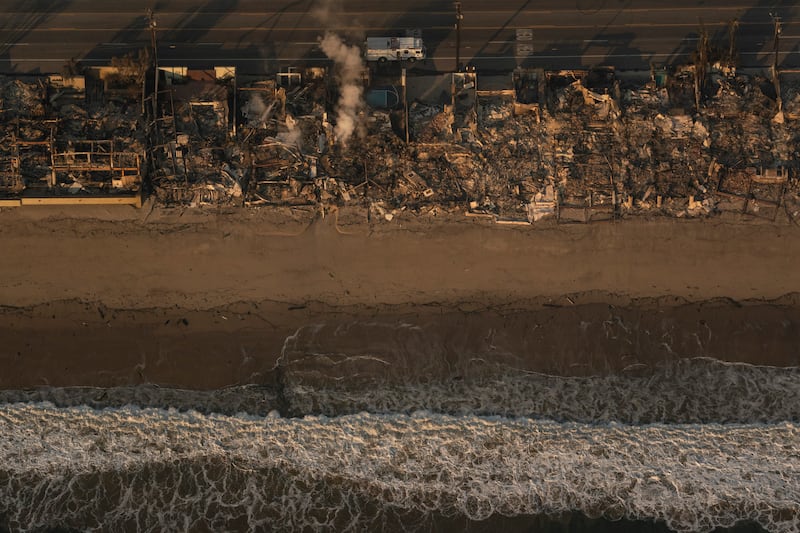 Homes destroyed by the Palisades fire along the coast in Malibu, California. Photograph: Loren Elliott/The New York Times