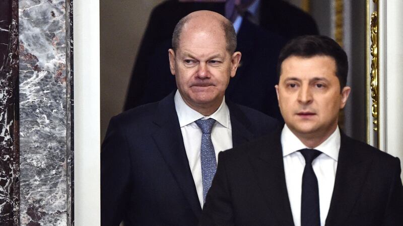 German chancellor Olaf Scholz and Ukrainian president Volodymyr Zelenskiy arrive to hold a joint press conference in Kyiv on Monday. Photograph:  Sergei Supinsky/AFP via Getty Images