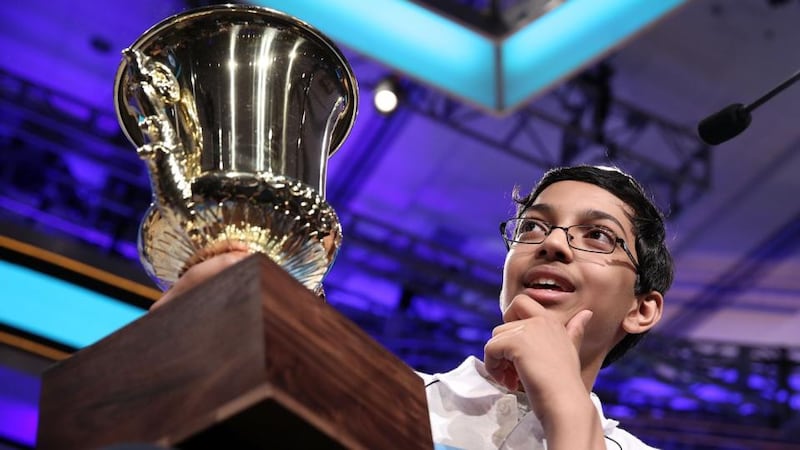 Arvind Mahankali holds his trophy after the finals of the 2013 Scripps National Spelling Bee at Gaylord National Resort and Convention Center in National Harbor, Maryland. Photograph: Alex Wong/Getty Images