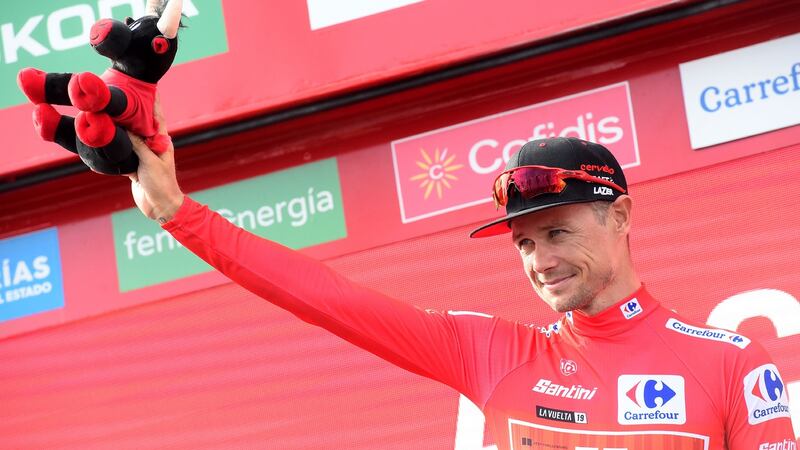 Nicolas Roche wears the leader’s red jersey after the third stage of the 2019 Vuelta. Photograph: Jose Jordan/Getty/AFP