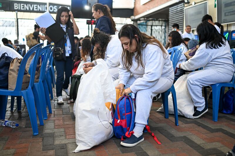 Guatemalan migrants deported from the United States are assisted at upon arrival at the Guatemalan Air Force base in Guatemala City on Wednesday. Photograph: Johan Ordóñez/AFP via Getty Images