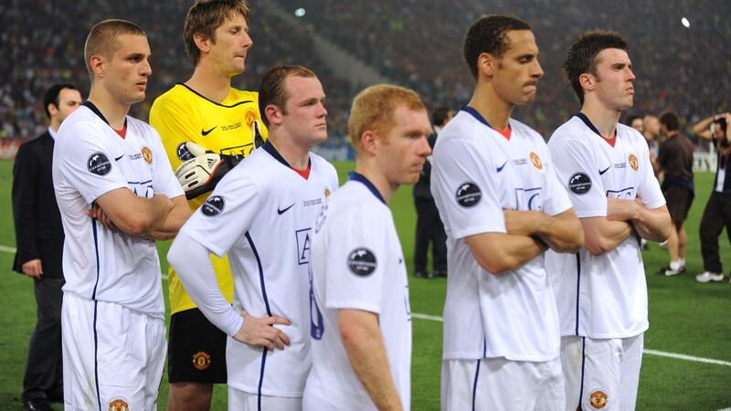 Manchester United players, including Carrick (far right), stand dejected after the Champions League final defeat to Barcelona in 2009. Photo: AMA/Corbis via Getty Images