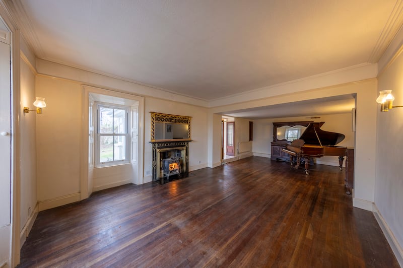 The drawing room makes light work of hosting a grand piano.