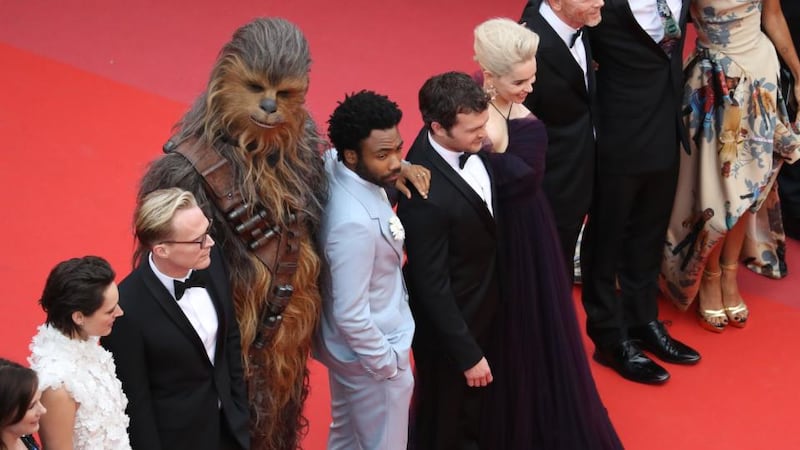 Solo: A Star Wars Story: Phoebe Waller-Bridge, Paul Bettany, Chewbacca, Donald Glover, Alden Ehrenreich, Emilia Clarke and Ron Howard at their film’s Cannes premiere. Photograph: Valery Hache/AFP/Getty