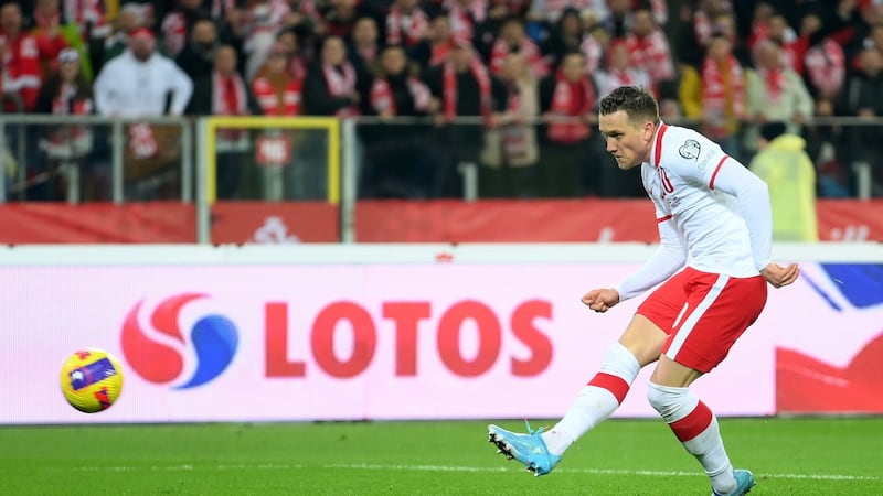 Piotr Zielinski scores Poland’s second goal during the World Cup playoff final against Sweden in Chorzow. Photograph:  Adam Nurkiewicz/Getty Images