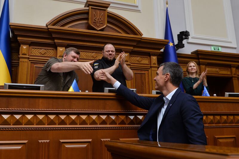 First deputy chief of the Ukrainian parliament Oleksandr Kornienko (left) shakes hands with Spanish Prime Minister Pedro Sanchez in the Ukrainian parliament in Kyiv.  Ukraine, 01 July 2023. Spain favours scrapping the required unanimity for the EU’s foreign policy decisions and move to qualified majority voting. Photograph: EPA/EFE