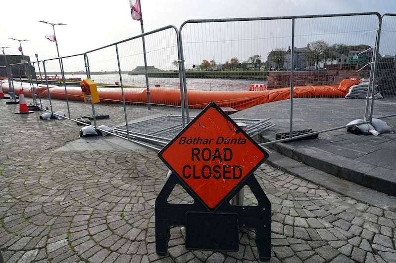 A road sign and flood defence in Galway city centre. Photograph: Brian Lawless/PA