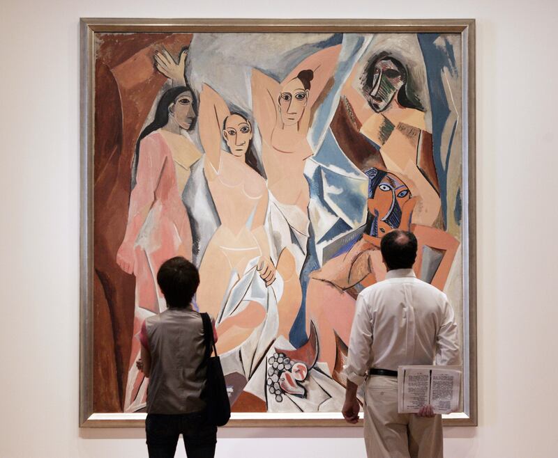 People view Pablo Picasso's Les Demoiselles d'Avignon (1907) on display at the Museum of Modern Art in New York. Photograph: Stan Honda/AFP/Getty