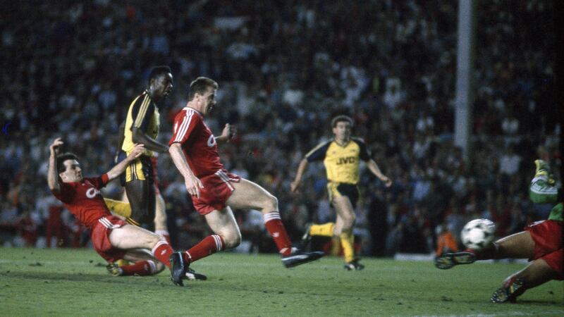 Michael Thomas holds his nerve and scores Arsenal’s title-winning goal at Anfield on May 26th 1989. Photograph:  Mark Leech/Getty