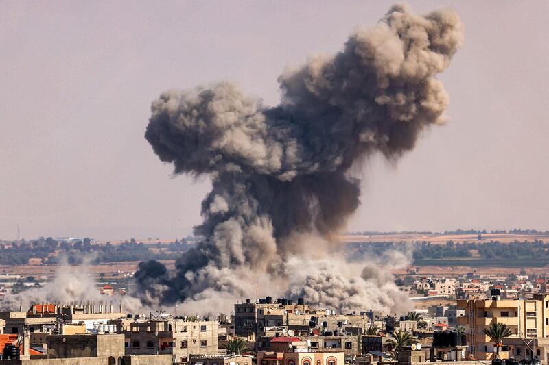 A smoke plume erupts during Israeli bombardment in Rafah in the southern of Gaza Strip on Thursday. Photograph: Said Khatid/AFP via Getty Images