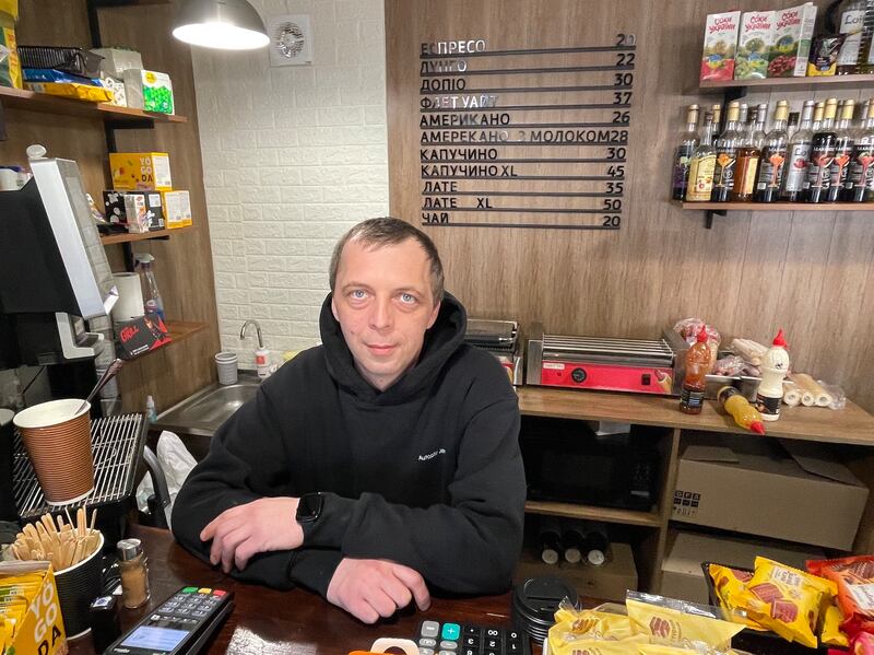 Denys Tymyk in his coffee shop in Mezhova, 20km from the front line in eastern Ukraine. Photograph: Daniel McLaughlin