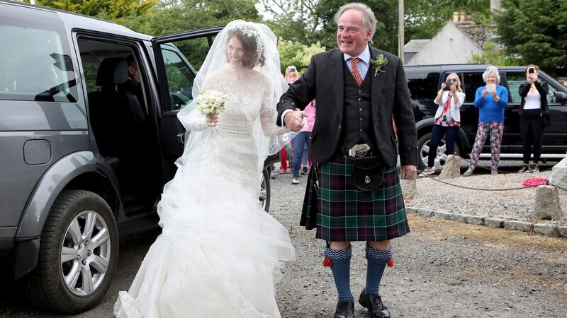 Rose Leslie with her father Sebastian Leslie arrive at Rayne Church, Kirkton of Rayne in Aberdeenshire, for her wedding ceremony with Game Of Thrones co-star Kit Harington. Photograph:  Jane Barlow/PA Wire