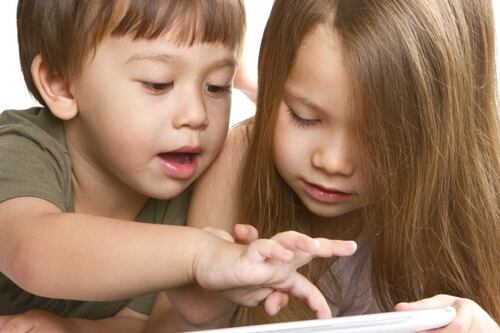For toddlers, taking a swipe is no substitute for traditional skills