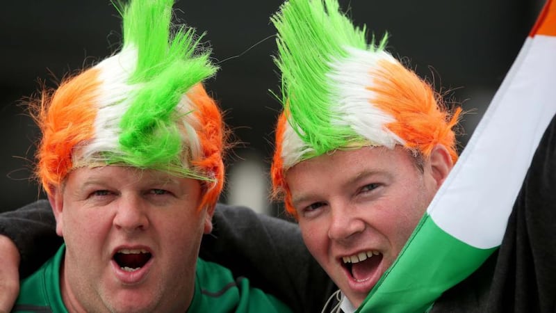 Irish fans Michael Coyne and Oliver Broderick from Co Waterford celebrate victory in Paris. Photograph: Dan Sheridan/Inpho