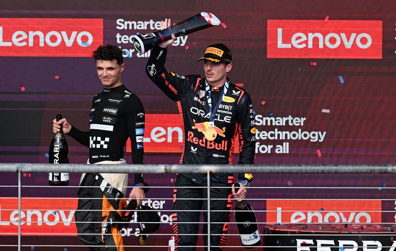 McLaren's Lando Norris (left) and Red Bull's Max Verstappen on the podium after last season's United States Grand Prix in Austin, Texas. Photograph: Jim Watson/AFP via Getty Images)