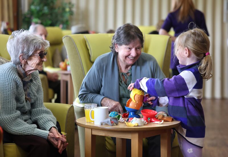 Mary Byrne and Kathleen Walsh have great fun with Kate. Photograph: Dara Mac Dónaill







