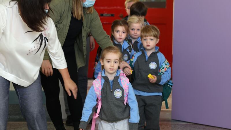 Junior infants  in transit at Gaelscoil Eoin. Photograph: The Irish Times