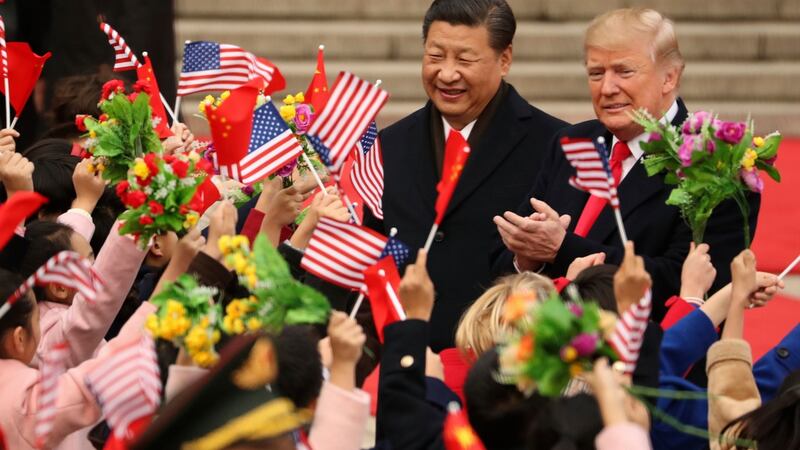 President Donald Trump and Chinese president Xi Jinping participate in a welcome ceremony at the Great Hall of the People in Beijing. Photograph: AP/Andrew Harnik