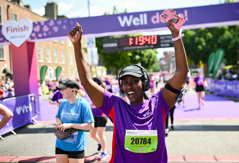 Ambassador Katja Mia crossing the finish line. Photograph: David Fitzgerald/Sportsfile